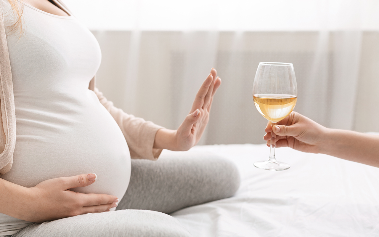 no_alcohol_during_pregnancy_young_pregnant_shutterstock_1324135739.jpg